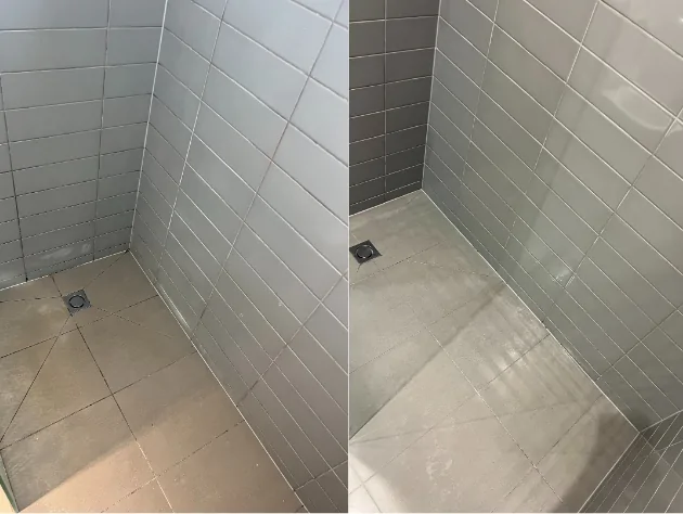 Professional shower cleaning with grey tiles